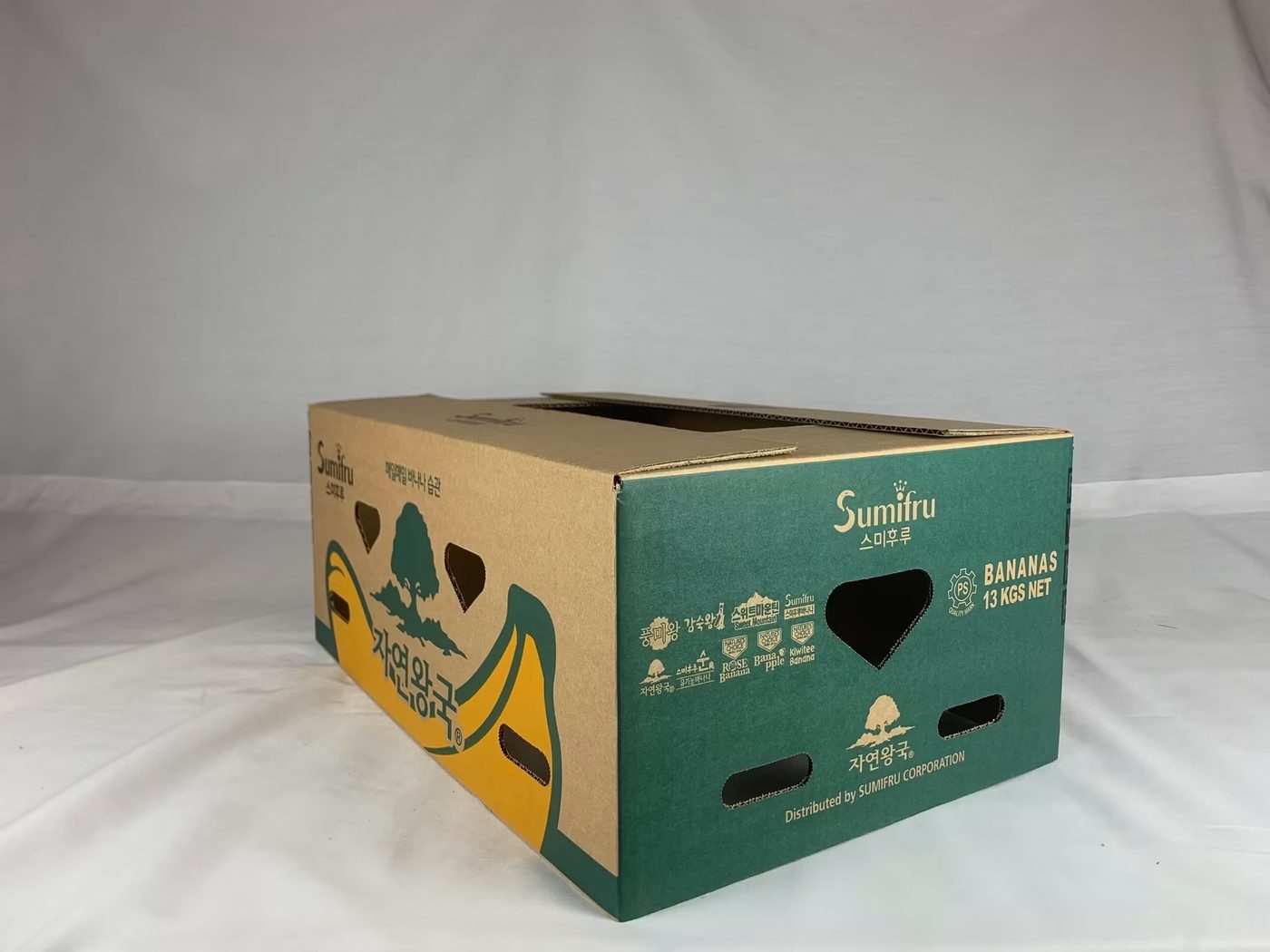Two-piece banana export carton with green flexo print