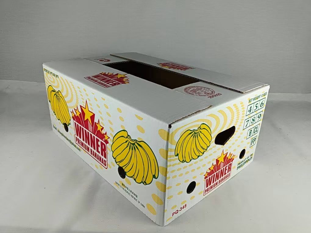 White winner banana carton with yellow print